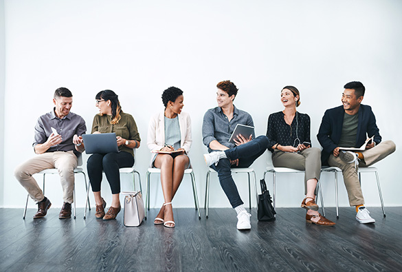  six people sitting on chairs